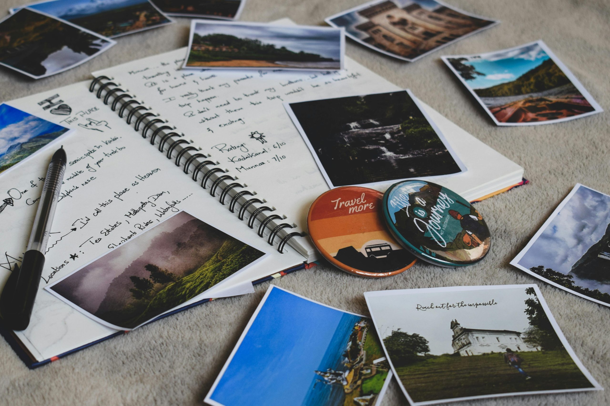 Assorted-photos and Notebook on the floor